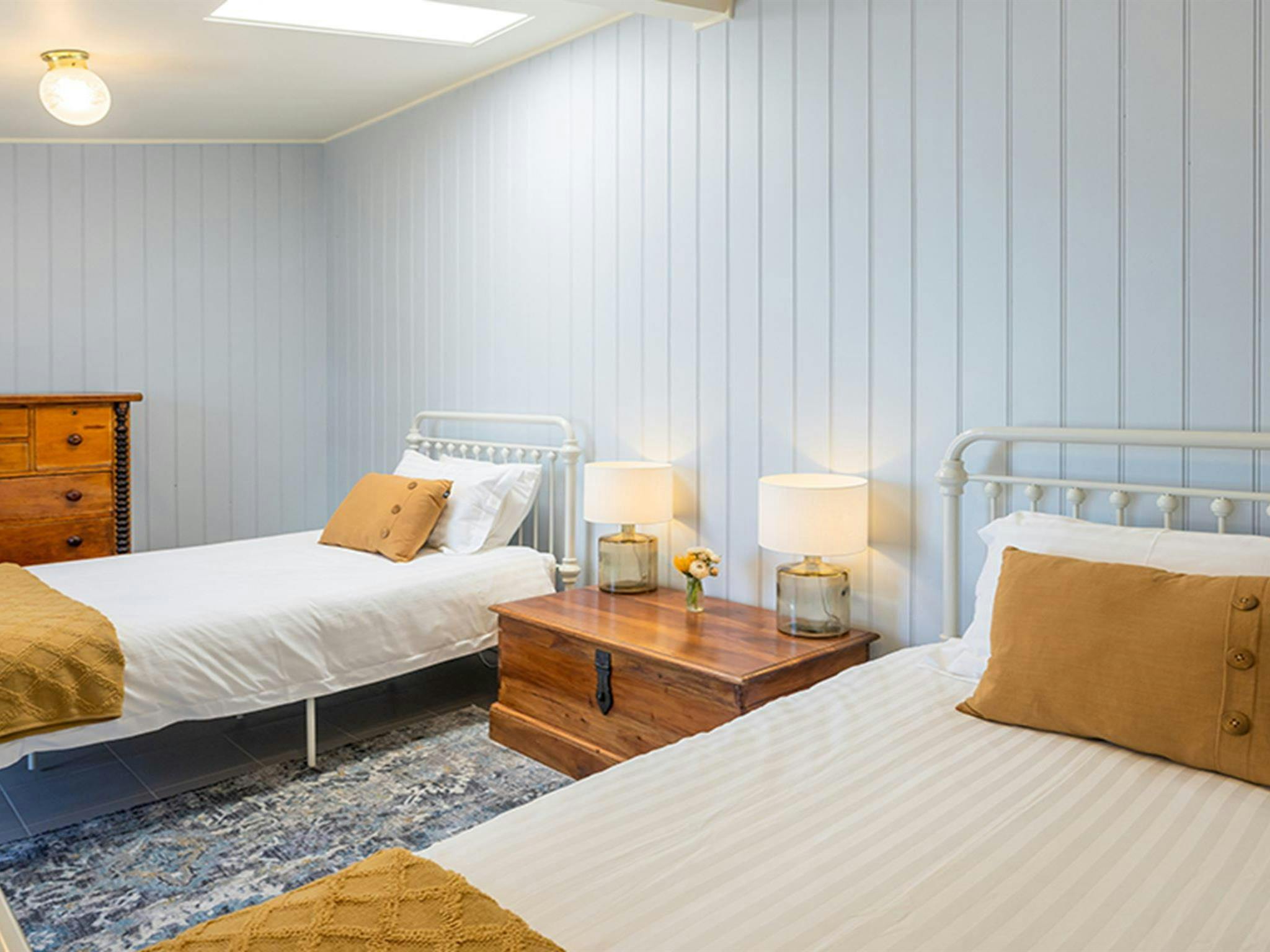Twin beds in a bedroom at Montague Island Head Lighthouse Keeper's Cottage. Photo: David Rogers/DPE