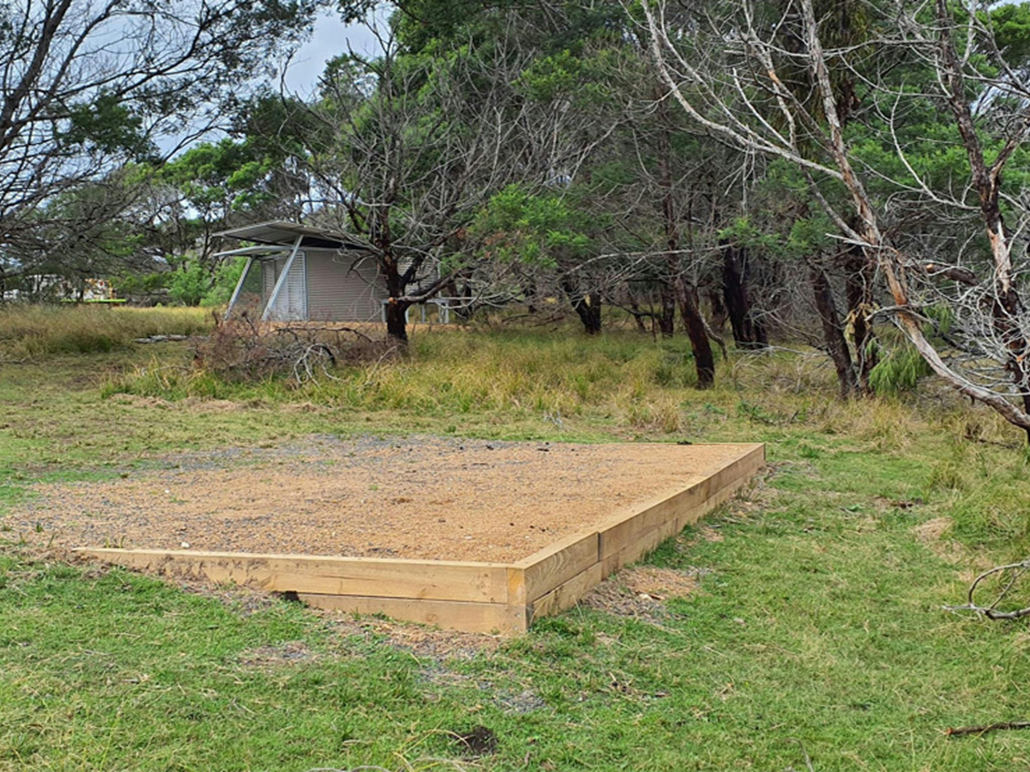 Gravel camping pad at Mowarry campground, Beowa National Park. Photo: DCCEEW &copy; DCCEEW