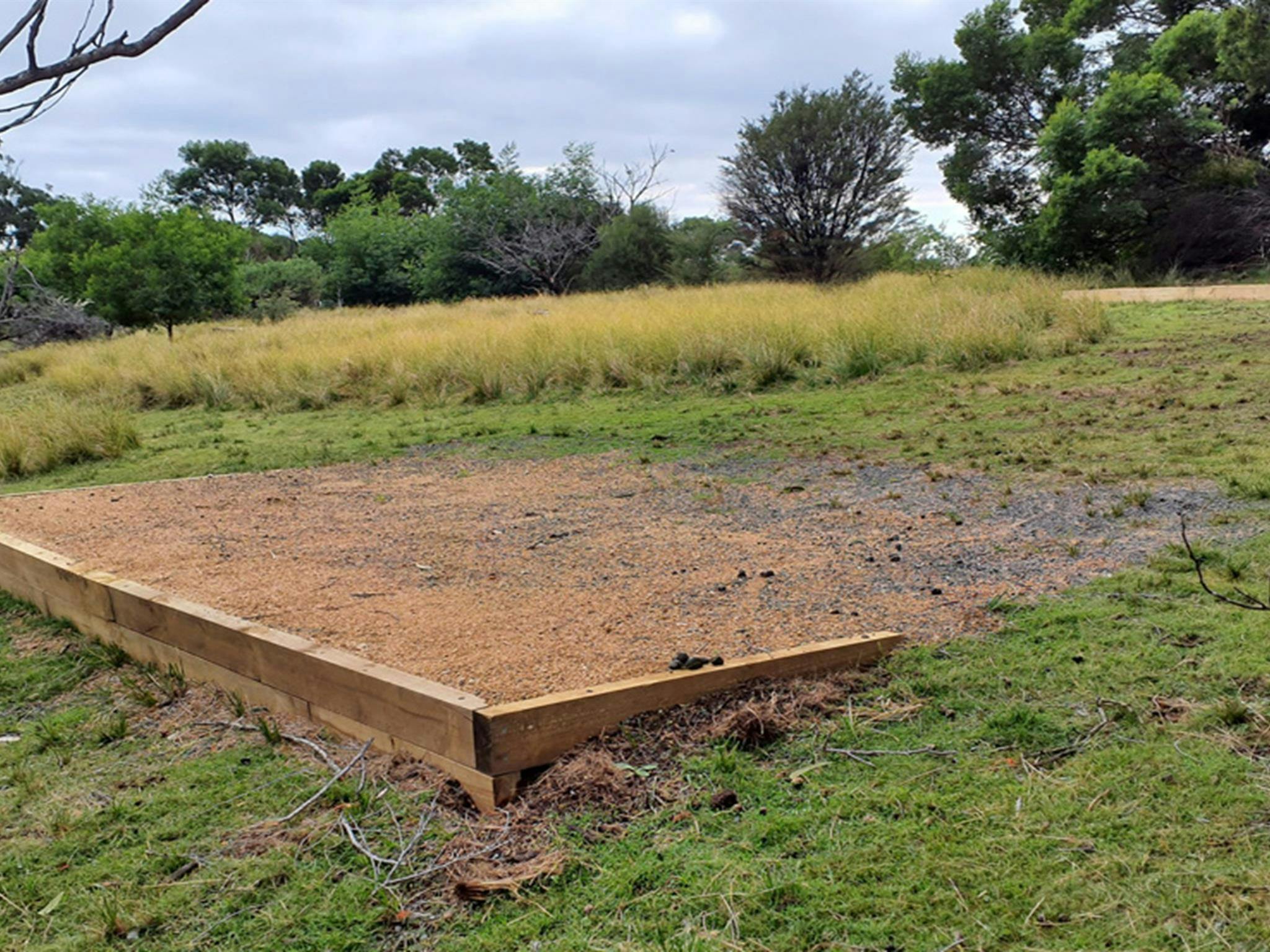 Gravel camping pad at Mowarry campground, Beowa National Park. Photo: DCCEEW &copy; DCCEEW