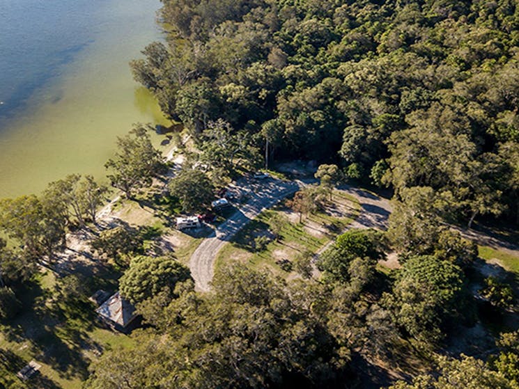 Aerial view of Mungo Brush campground and nearby Myall Lake in Myall Lakes National Park. Photo: