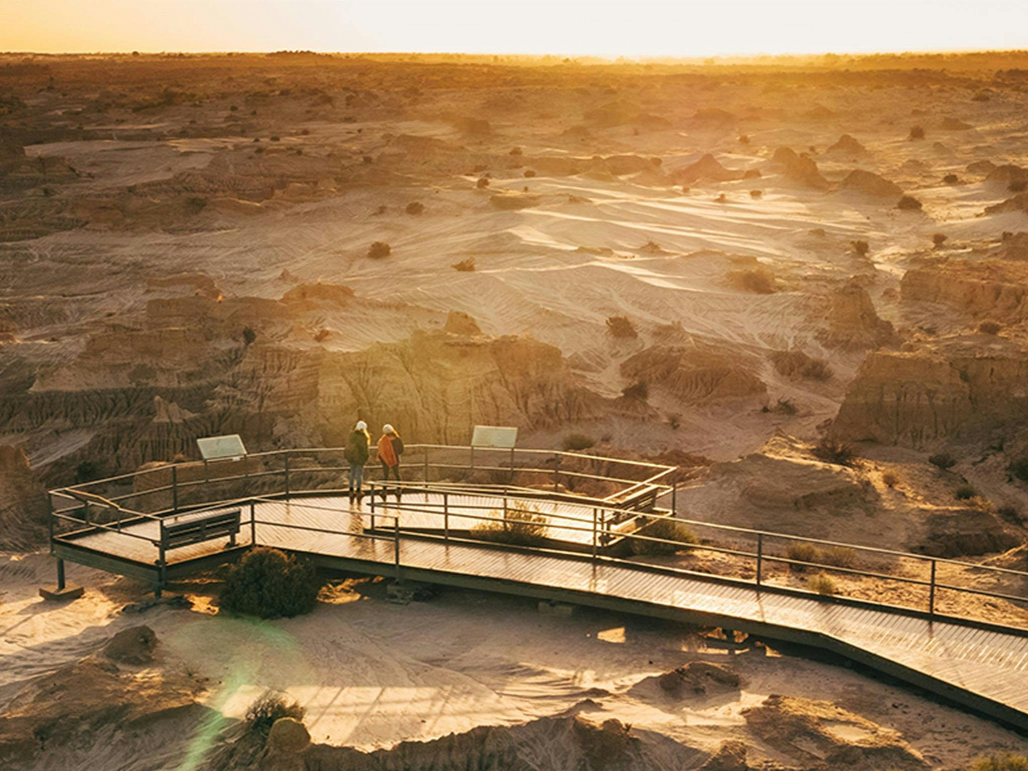 Aerial view of Red Top lookout and sweeping sand dunes at sunset. Credit: Melissa Findley/DCCEEW