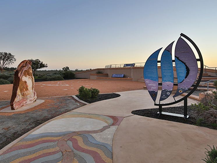 Interpretive signs and art displays outside Mungo Visitor Centre in Mungo National Park. Photo: