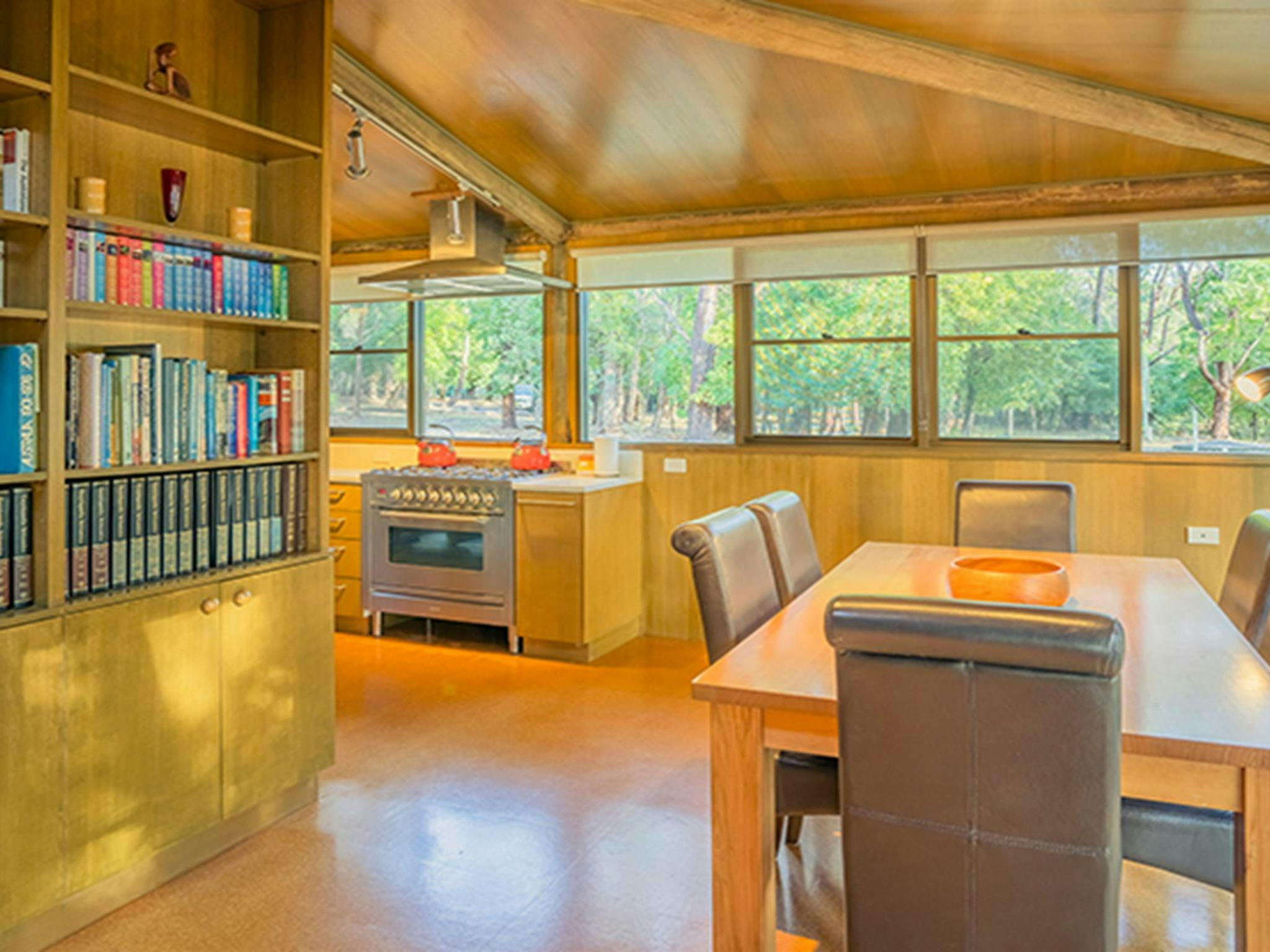 Breakfast dining area with forest views at Myer House. Photo: OEH/John Spencer