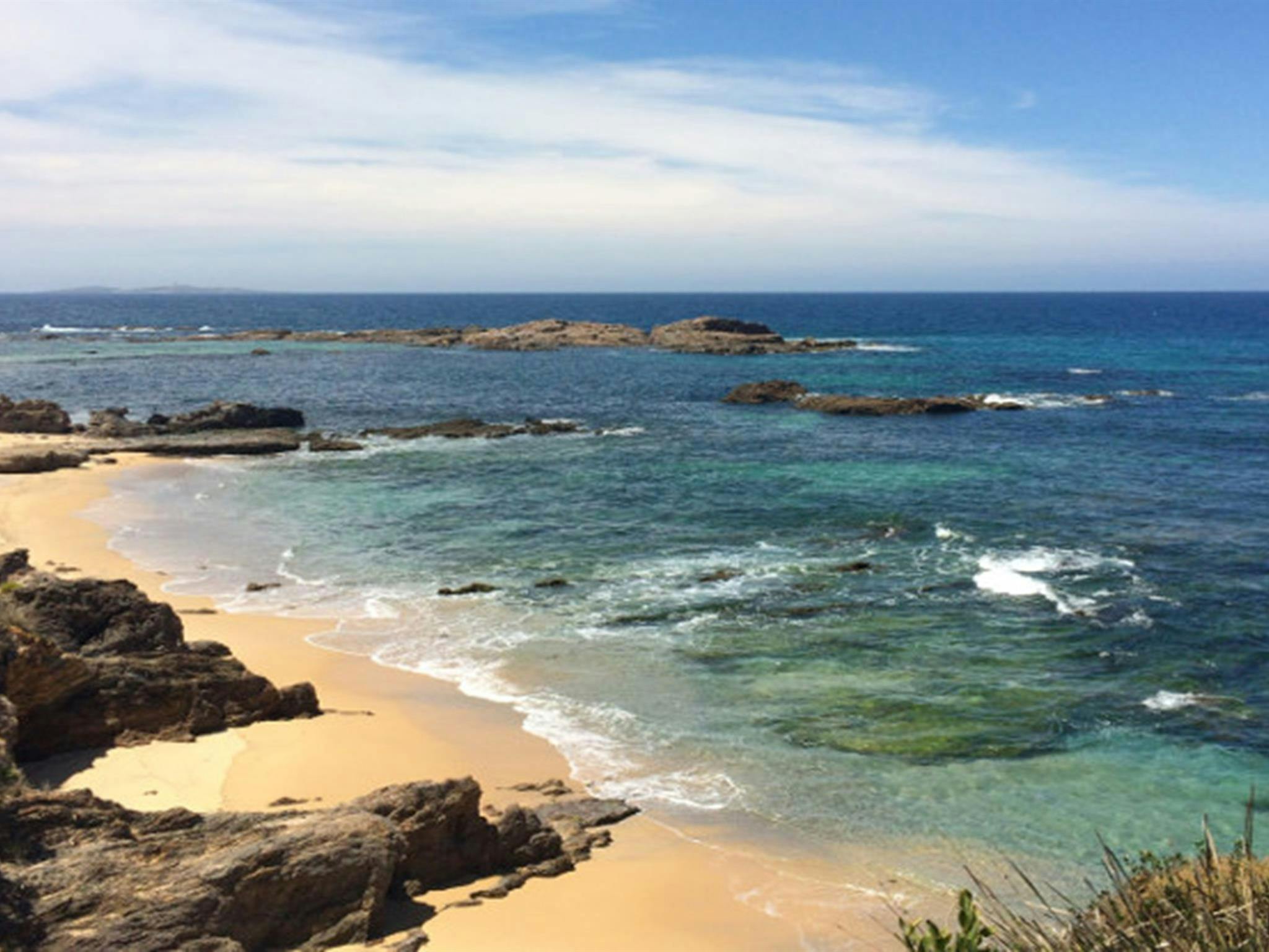 Beach views from Mystery Bay lookout across to Montague Island, near Narooma in Eurobodalla National