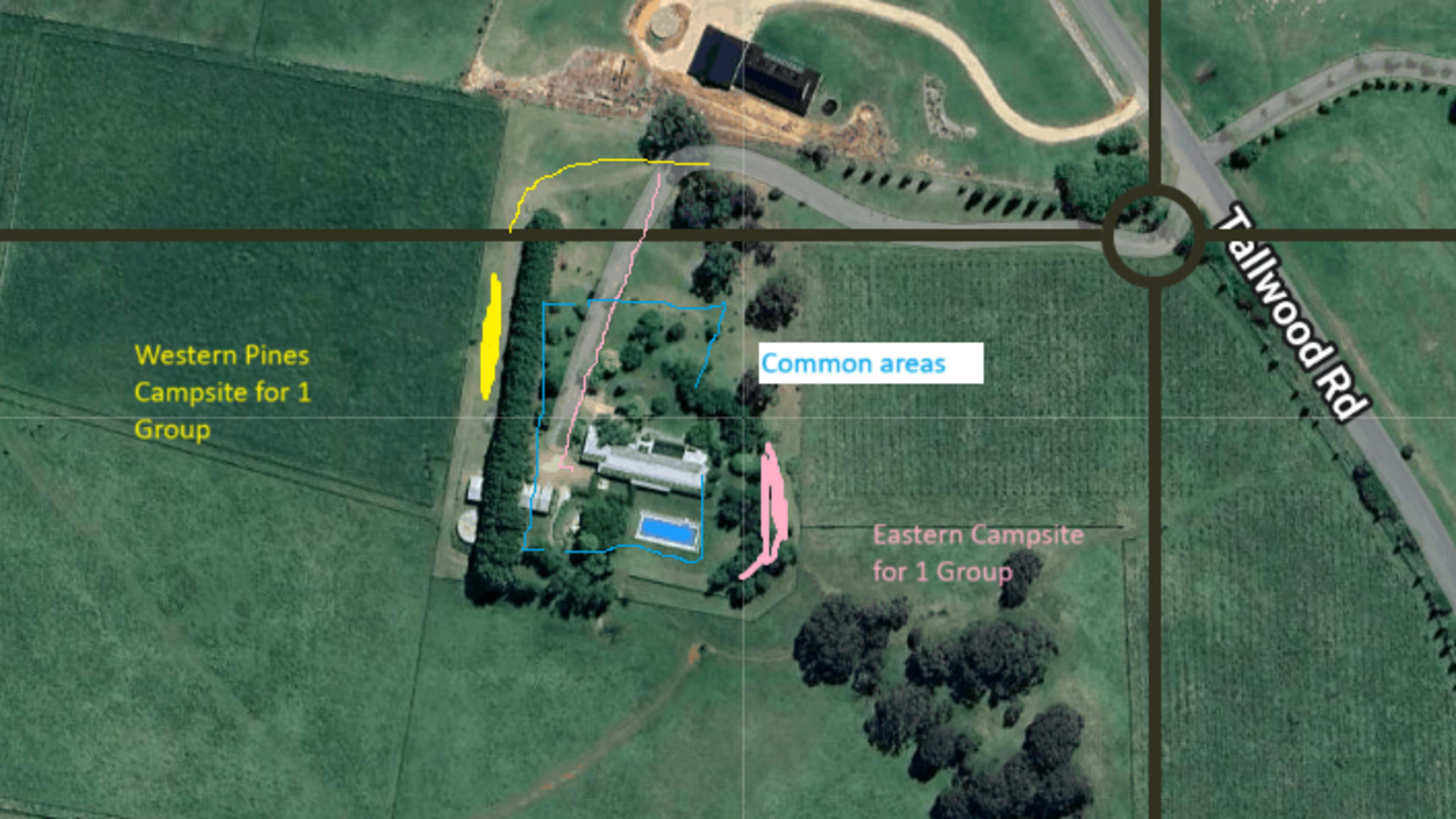 Aerial google earth recent photo. ONLY the YELLOW camper site is available to book. The pink campsite is NOT AVAILABLE. Blue are common areas.