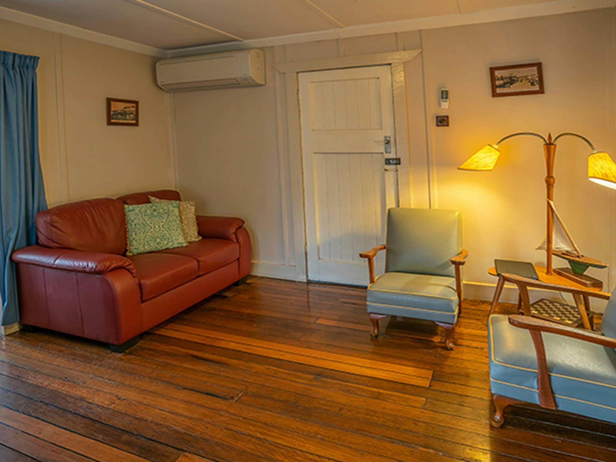 Retro-style lounge room in Partridge cottage. Photo: DPIE/John Spencer
