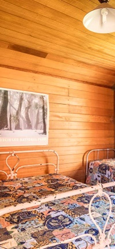 Bedroom in The Pines Cottage, Kosciuszko National Park. Photo: Murray Vanderveer/OEH