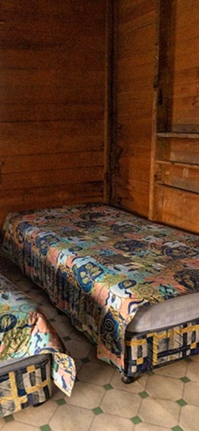 Two single beds at The Pines Cottage, Kosciuskzo National Park. Photo: Rob Mulally/DPIE