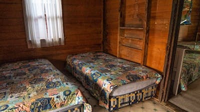 Two single beds at The Pines Cottage, Kosciuskzo National Park. Photo: Rob Mulally/DPIE