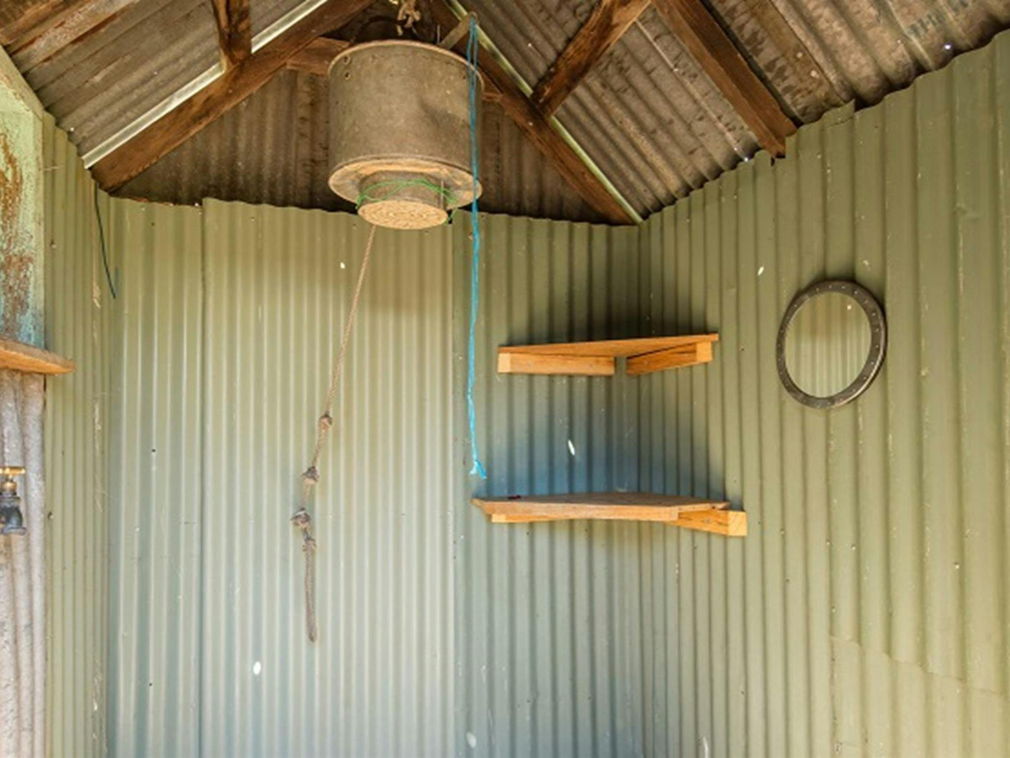 Shower in The Pines Cottage, Kosciuszko National Park. Photo: Murray Vanderveer/OEH