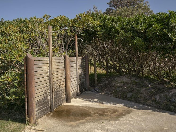 Outdoor shower facility at Point Plomer campground, Limeburners Creek National Park. Photo: John