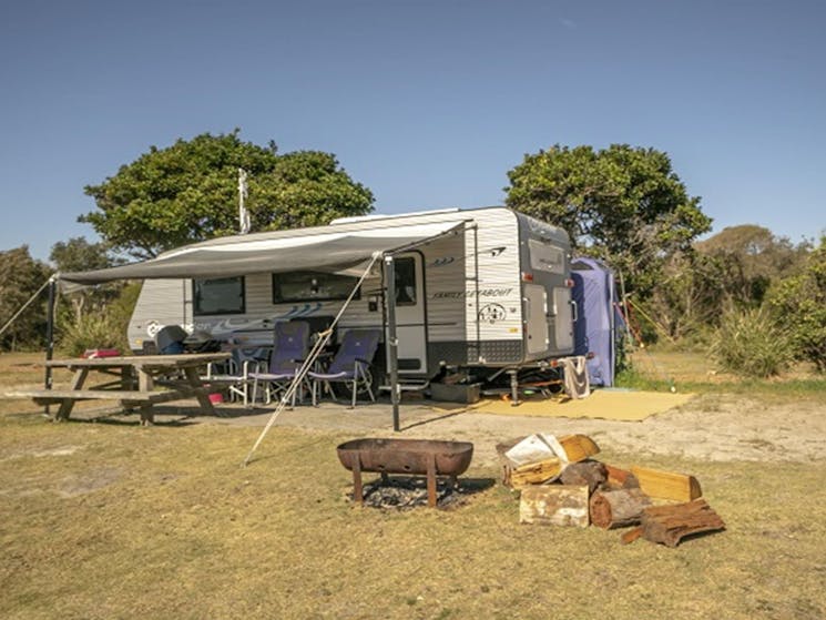 Caravan parked on site at Point Plomer campground, Limeburners Creek National Park. Photo: John