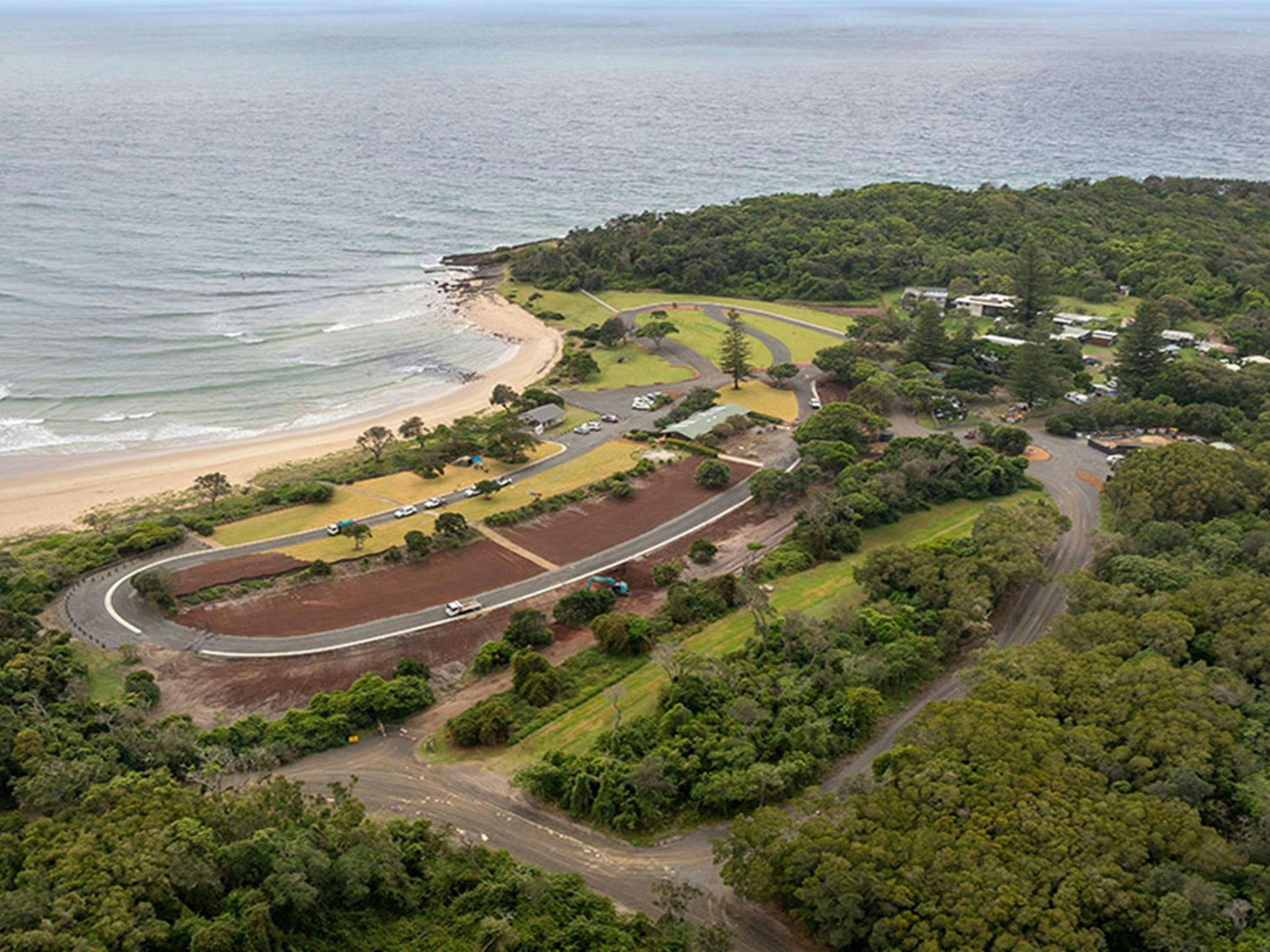 Aerial view of the bushland and beach at Point Plomer campground. Credit: John Spencer &copy; DCCEEW