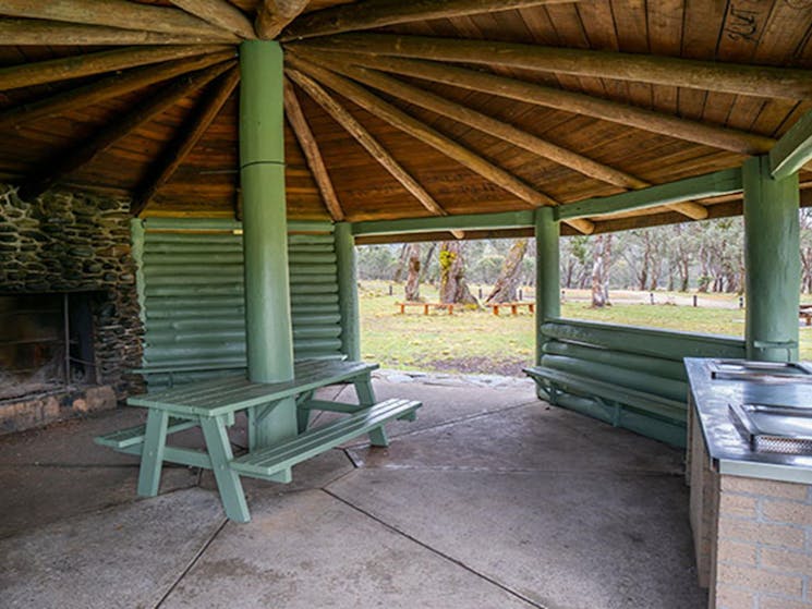 Barbecue facilities under a covered pavilion in Polblue campground and picnic area, Barrington Tops