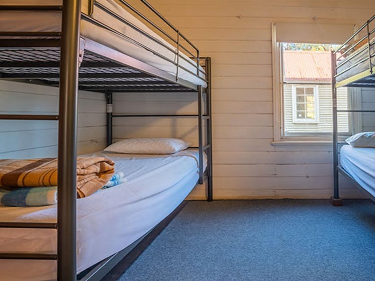 Two single bunk beds in Post Office Lodge, located in Yerranderie Private Town, Yerranderie Regional