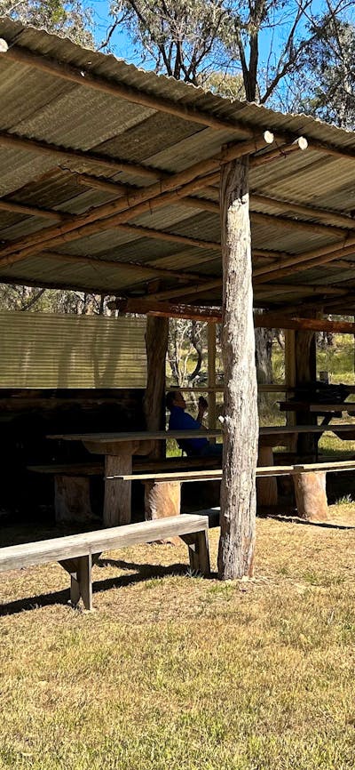 BUSH KITCHEN: picnic table & benches seats 16, food prep bench, x2 gas cookers (BYO LPG gas), double sink (no taps, BYO water), undercover firepit.