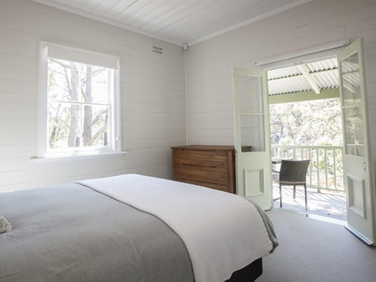 A queen bedroom in Reids Flat Cottage, Royal National Park. Photo: Rosie Nicolai/OEH