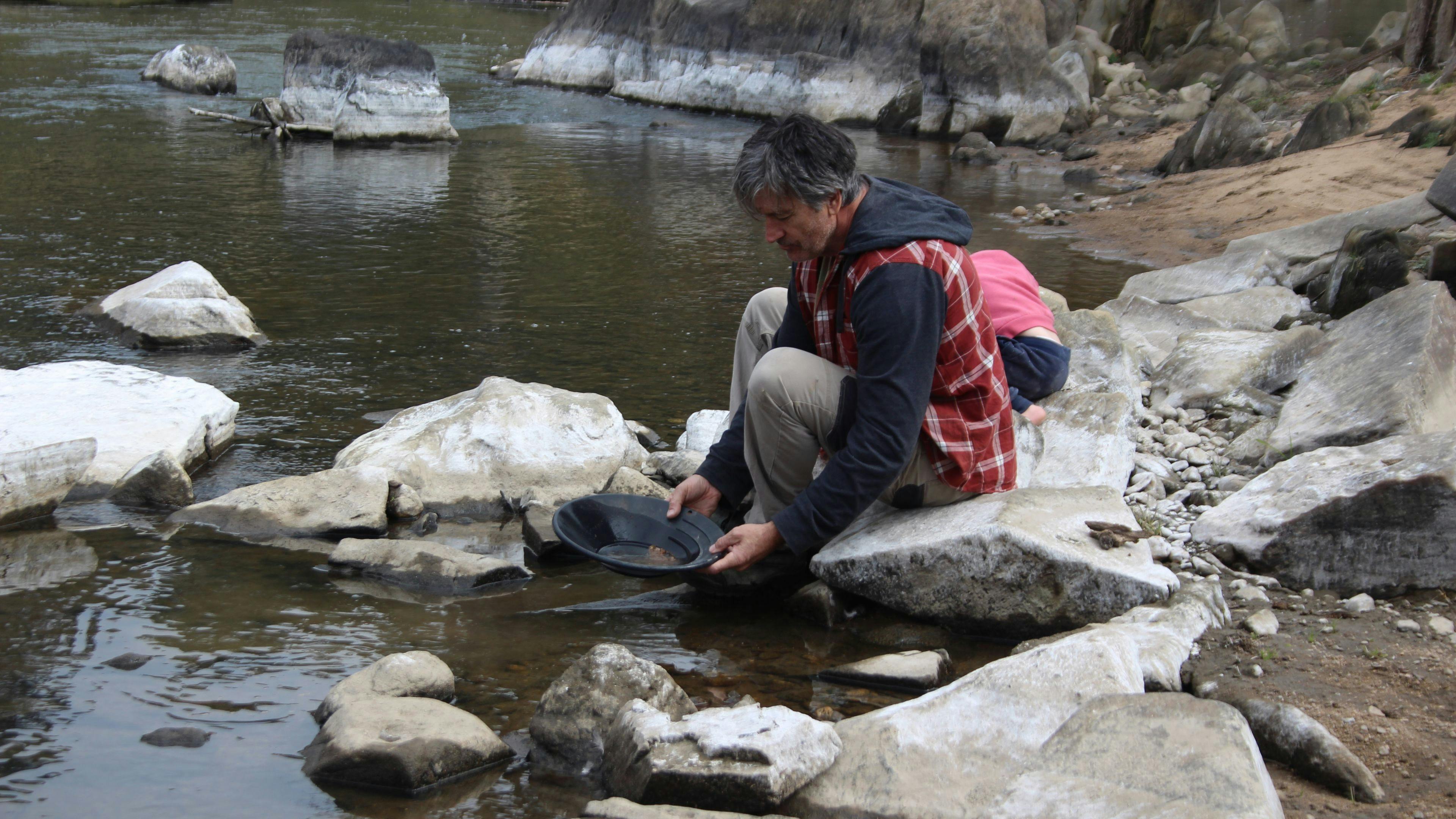 Panning for gold. 