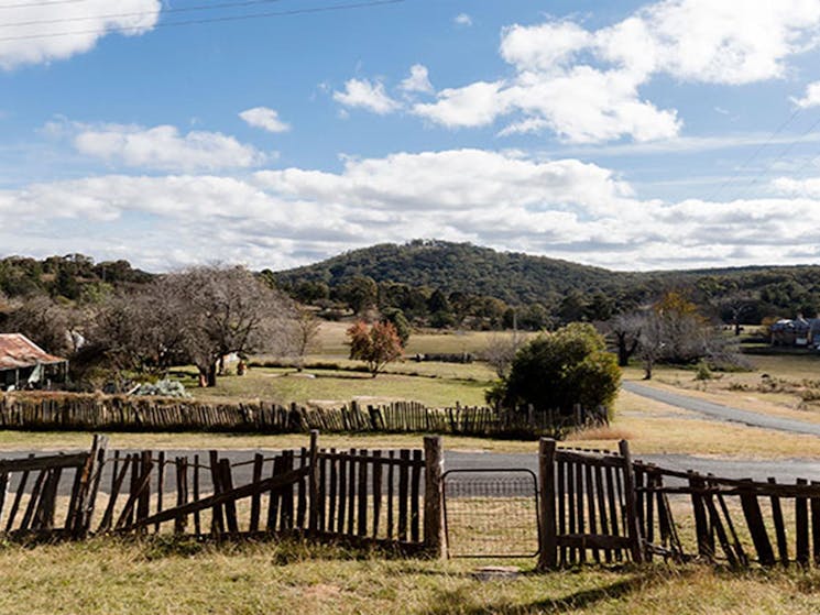 The fence and surrounding countryside at Sacred Heart Church in Hill End Historic Site. Photo:
