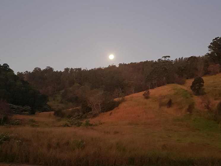 Moon rising over the hills