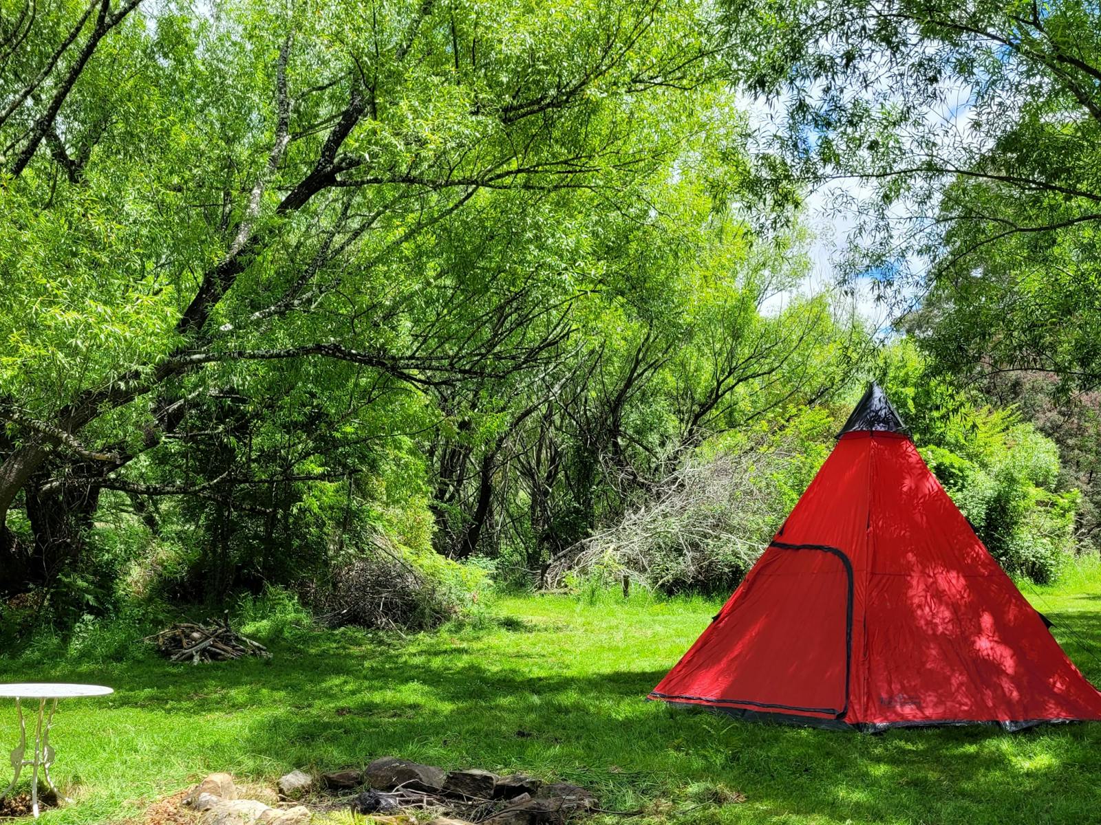 Small Campsite with Teepee Shaped Tent set up