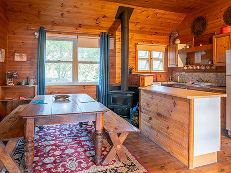 Kitchen and dining area in Slippery Norris Cottage, Yerranderie Regional Park. Photo: John
