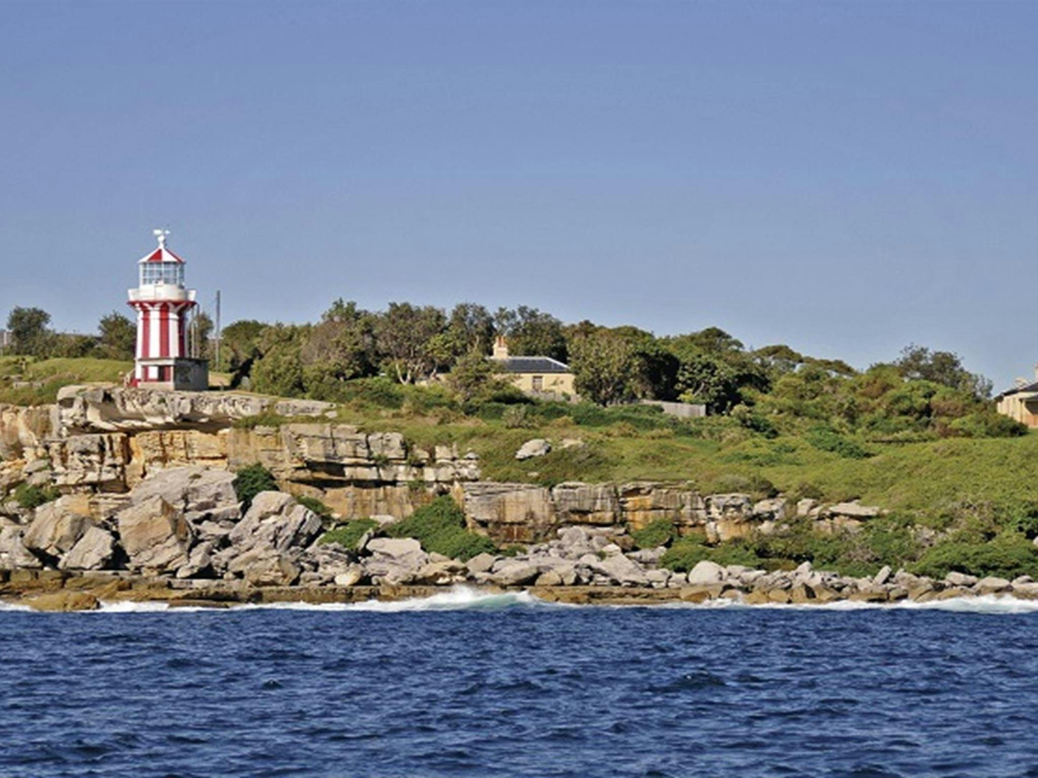 Hornby Lighthouse and the ocean cliffs of South Head. Photo: Kevin McGrath/OEH