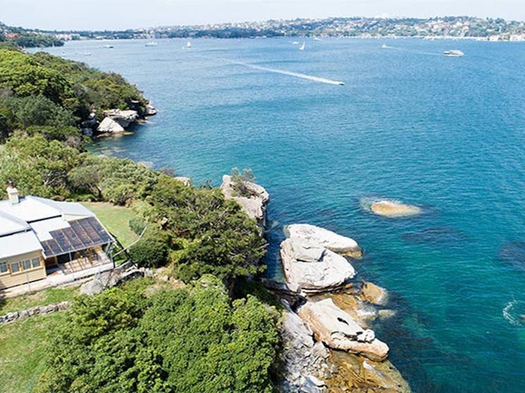 Aerial view of Steele Point Cottage by the water in Sydney Harbour National Park. Photo: G