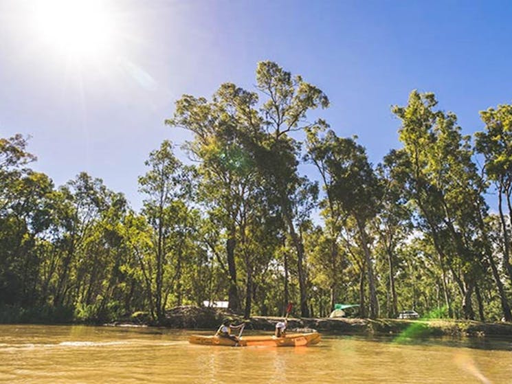 Kayakers float past Swifts Creek campground, Murray Valley National Park. Photo: B Ferguson/OEH