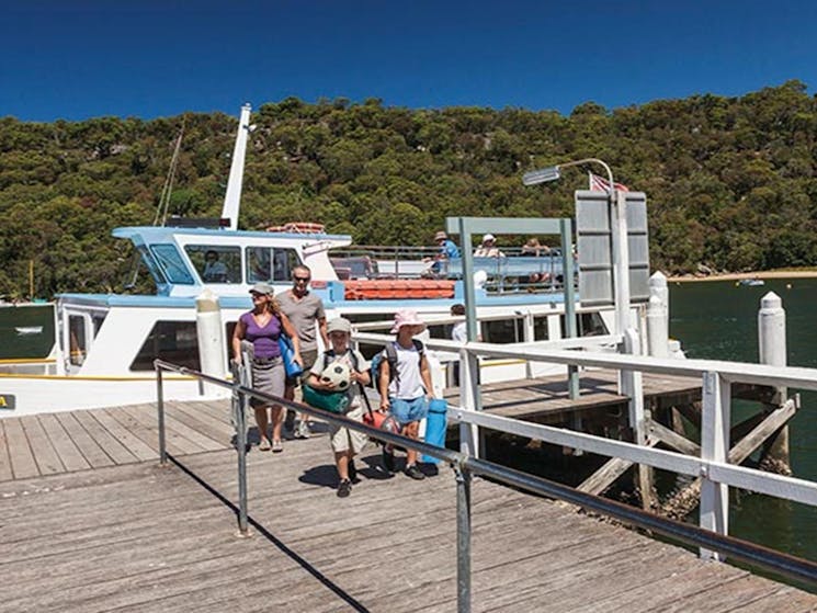 A family arriving at The Basin Jetty. Photo: David Finnegan &copy; OEH
