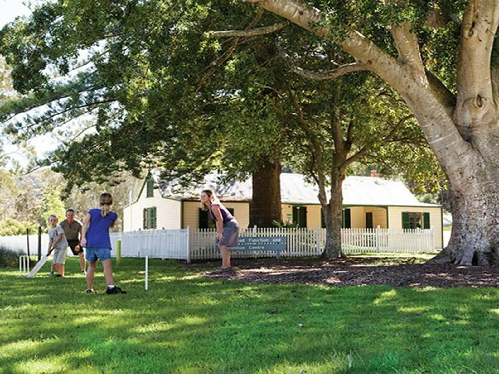 Family playing cricket at The Basin picnic area. Photo: David Finnegan © OEH