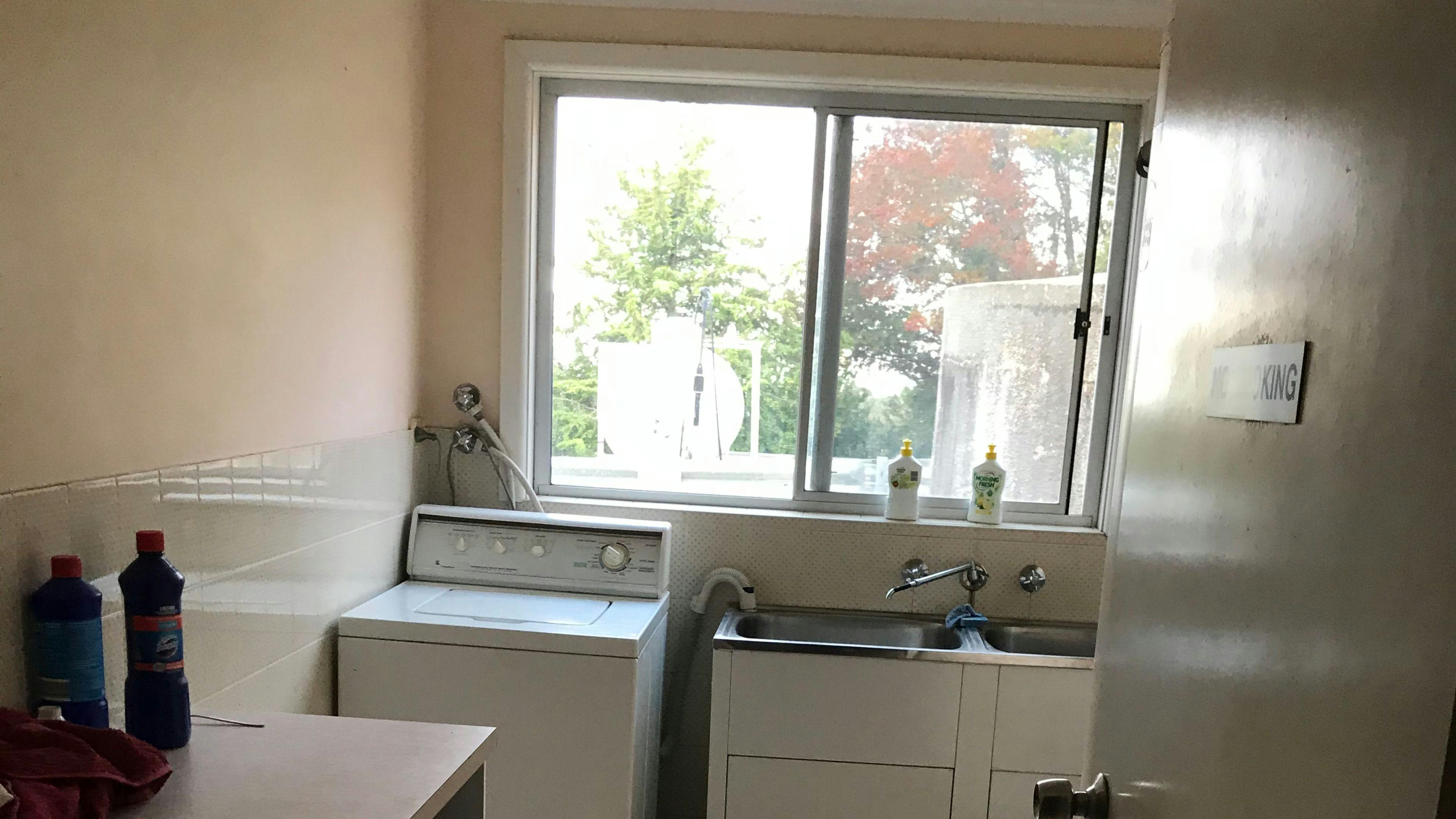 Fitted out laundry, hot and cold water, wash tubs, benches