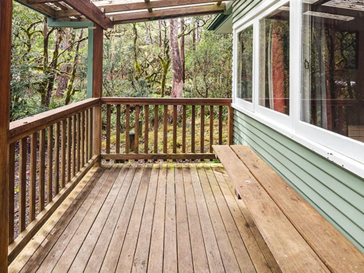 The verandah at Toms Cabin, New England National Park. Photo: Robert Cleary &copy; DPIE