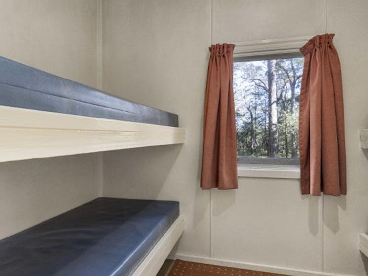 The beds at one of the bedrooms in Toms Cabin in New England National Park. Photo:  Mitchell Franzi