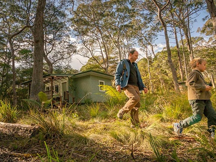 Father and son heading off for a walk from Toms Cabin in New England National Park. Photo: John
