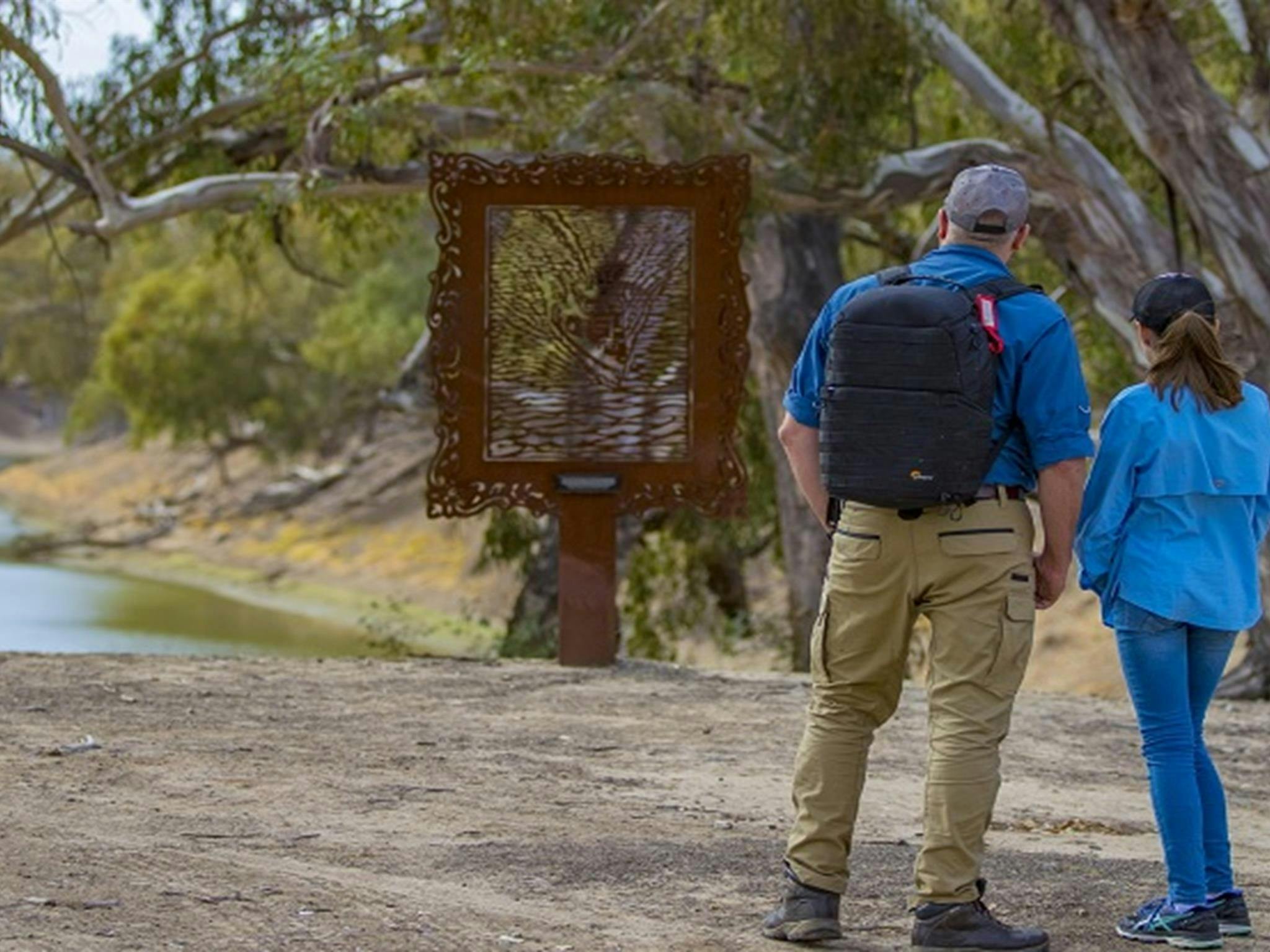 A father and daughter at Many Big Rocks picnic area, Toorale National Park. Photo: Joshua Smith/OEH