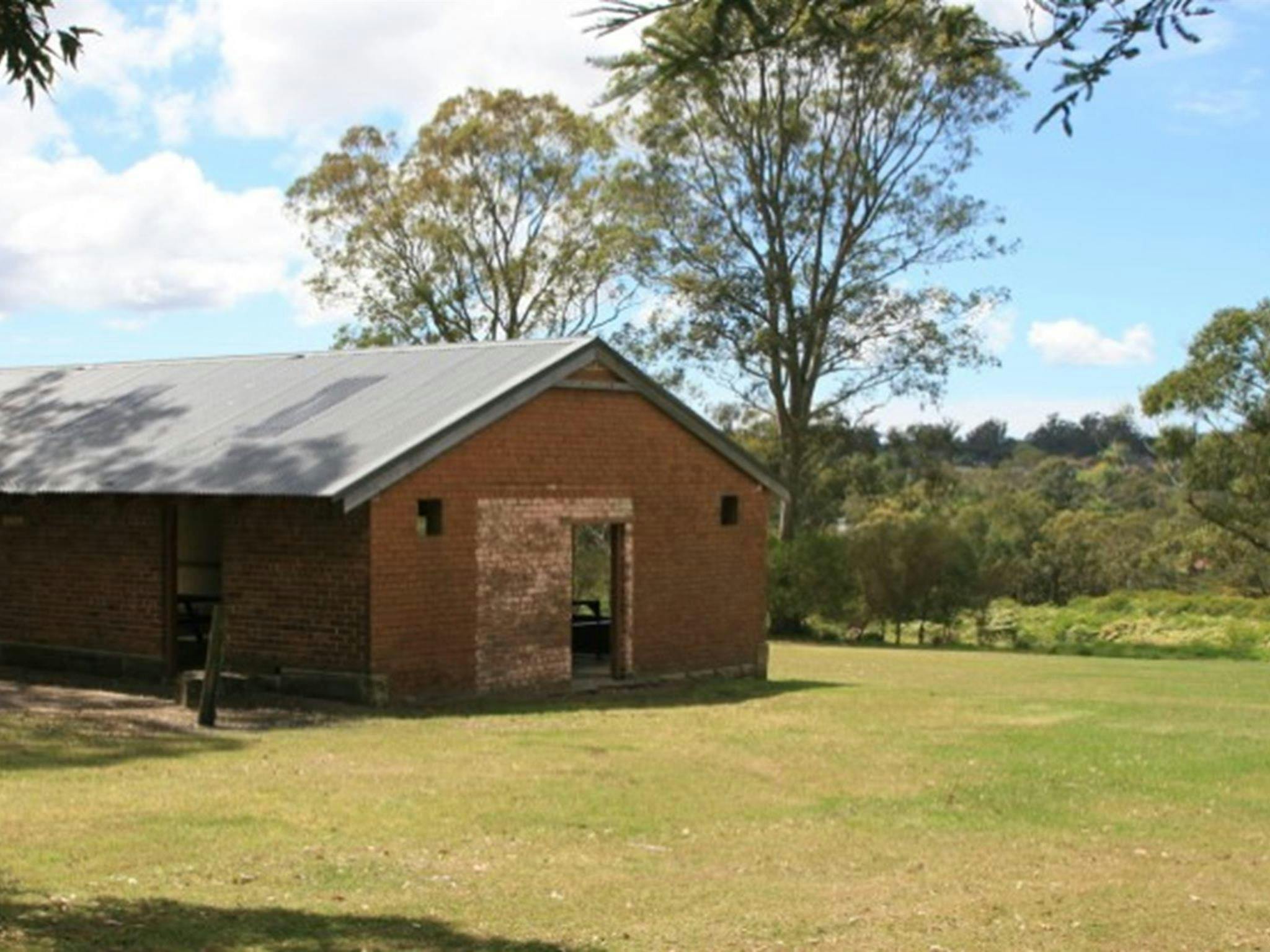 The outside of one of the picnic shelters at Tunks Hill picnic area in Lane Cove National Park.