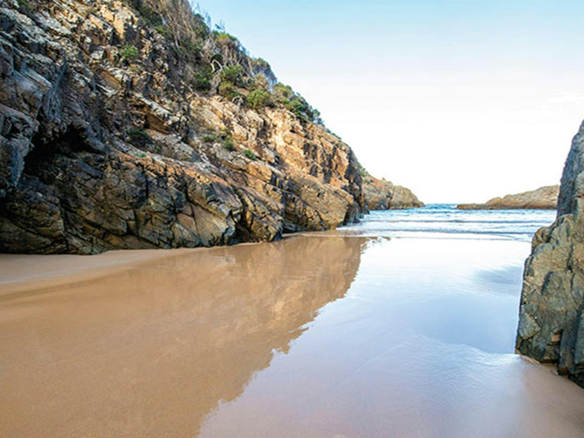 Rocky headland and beach at Turingal Head. Photo: John Spencer/DPIE