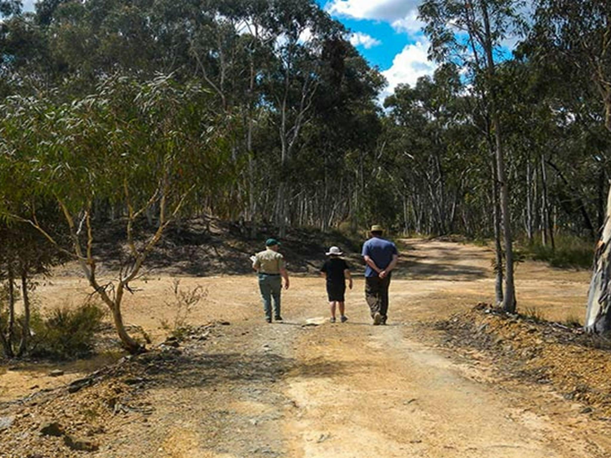 Visitors on their way to Valentines mine with an NPWS guide. Photo: Debby McGerty