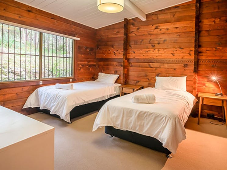 Twin bedroom in Weemalah Cottage, Royal National Park. Photo: John Spencer/OEH