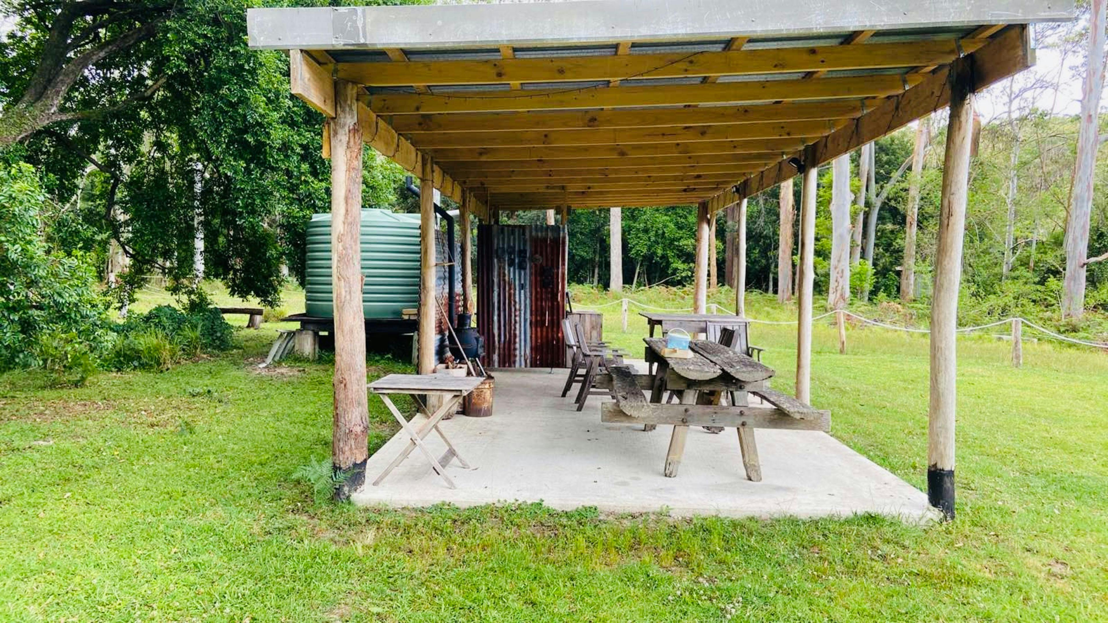 Another inside shot of covered area showing a better view of the picnic table