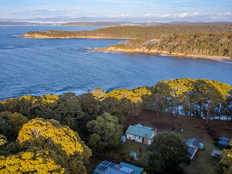 Aerial view of Yellow Rock Beach House, the ocean and headlands. Photo: John Spencer &copy; DPIE